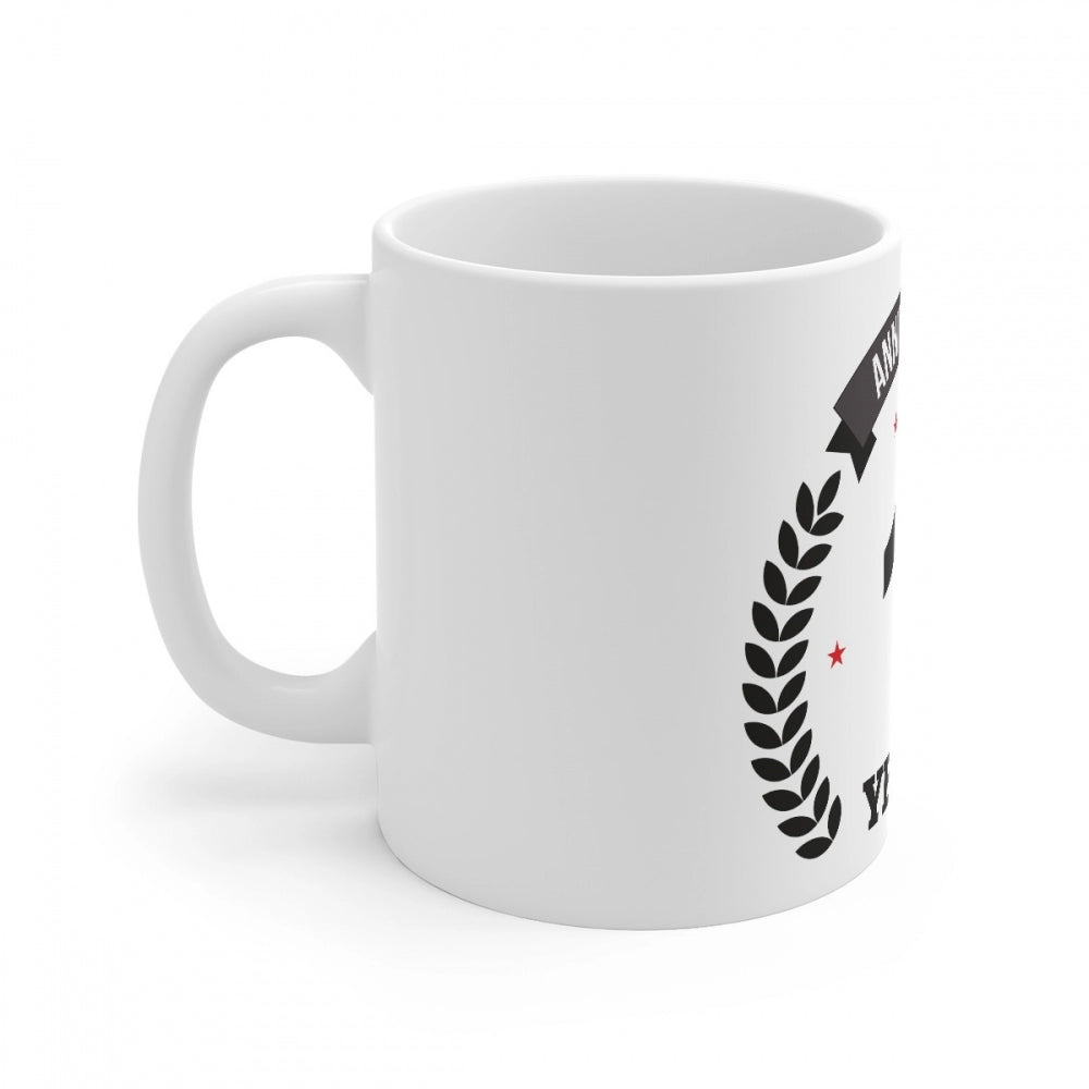 White ceramic coffee mug with printed anniversary design