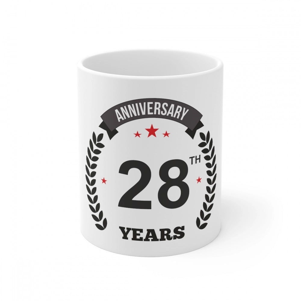 White ceramic coffee mug with anniversary celebration print and 330ml capacity