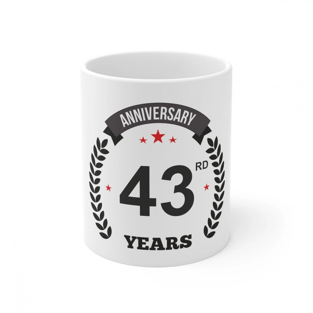 White ceramic coffee mug with printed anniversary design
