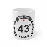 White ceramic coffee mug with printed anniversary design