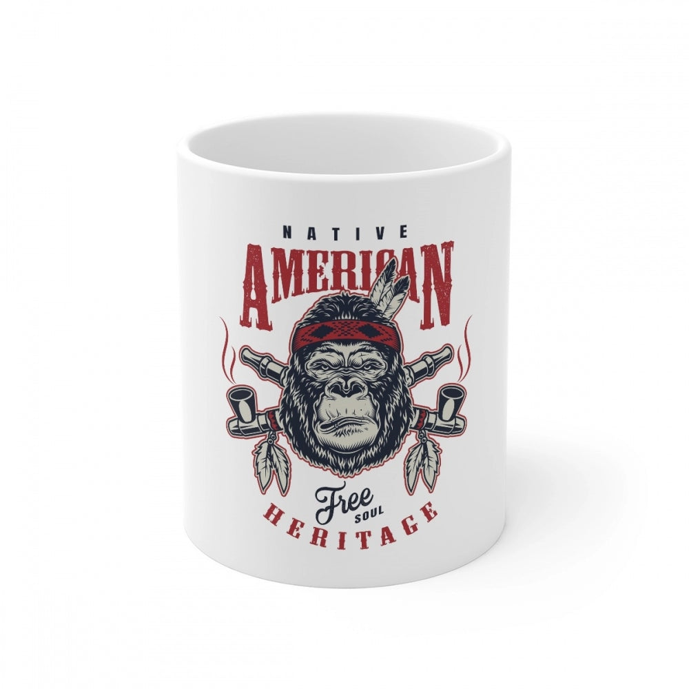 White ceramic coffee mug with a gorilla print featuring an American flag motif and the text 'Free in heritage', 330ml capacity