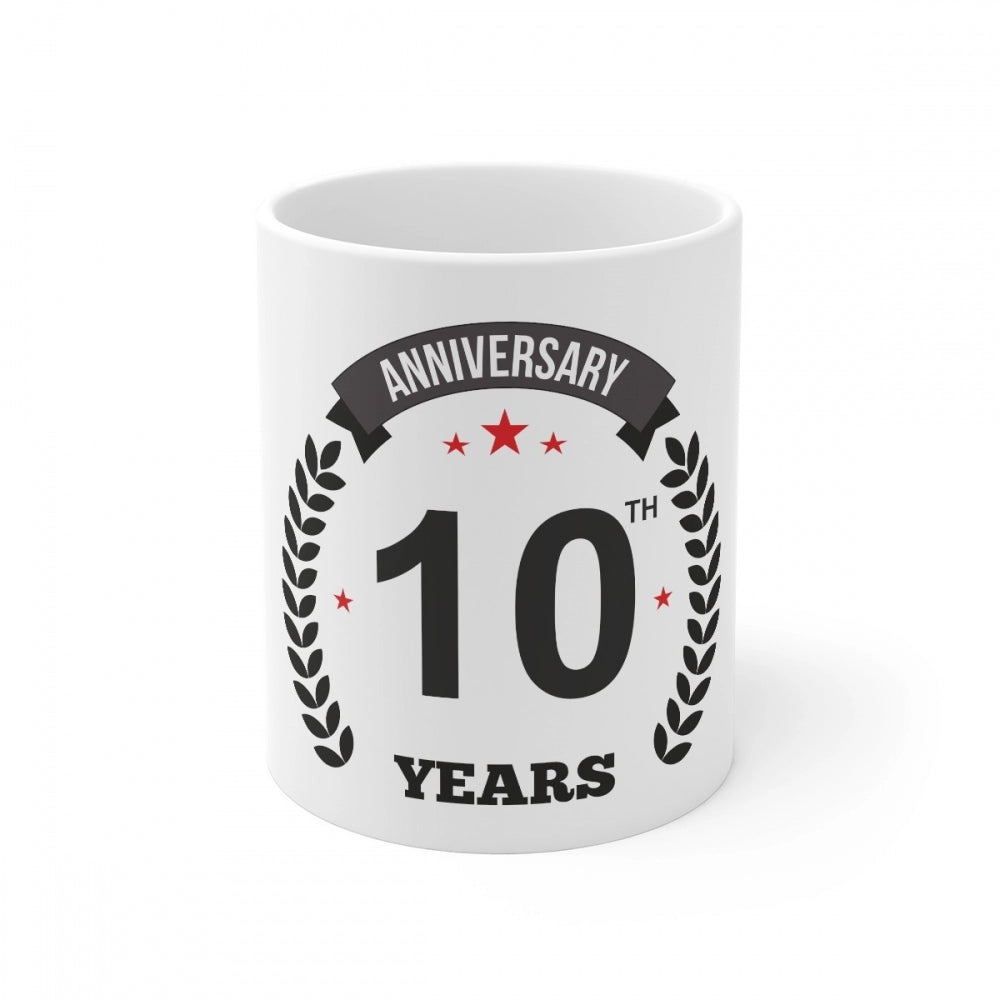 White ceramic mug with printed anniversary design and '10th Anniversary' inscription