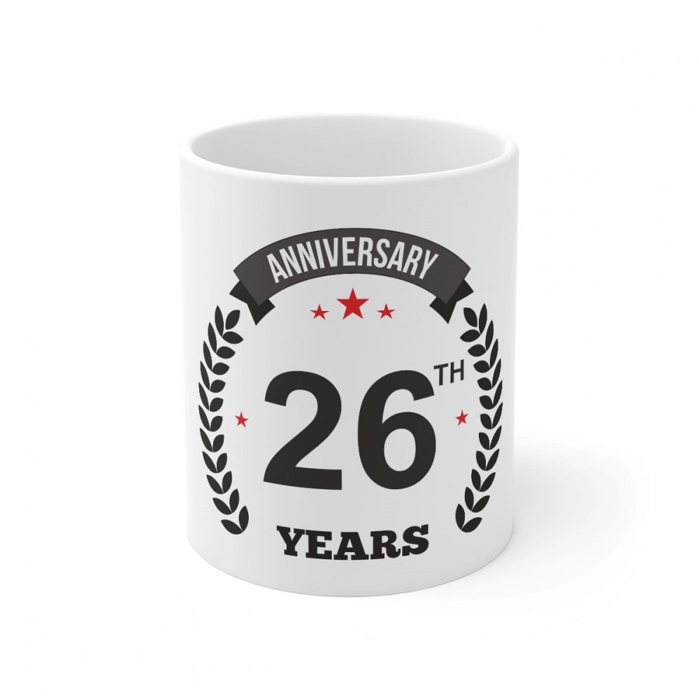 White ceramic coffee mug with a printed design and "Anniversary 26th" text. 330ml capacity