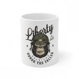 Ceramic mug with white background, black and white gorilla design, featuring text reading "Freedom", "CERAMIC GORILA DESIGN", "coffee mug", "330ml", "white mug