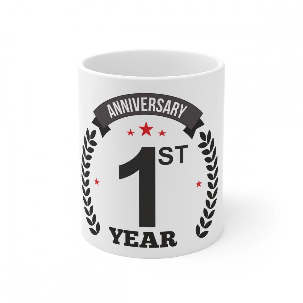 White coffee mug with printed first anniversary message and laurel wreath symbol