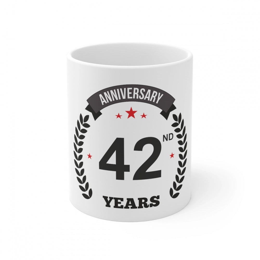 Ceramic anniversary coffee mug with printed text reading 'Anniversary 42nd' and '1500 ml