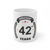 Ceramic anniversary coffee mug with printed text reading 'Anniversary 42nd' and '1500 ml