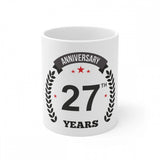 White ceramic coffee mug with printed anniversary message, reads 'Anniversary 27 years' and capacity of 330ml