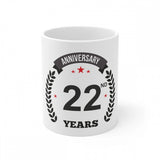 White ceramic mug celebrating 22 years with anniversary print