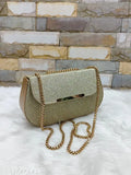 Purple velvet sling bag with gold trim, lining, and zipper