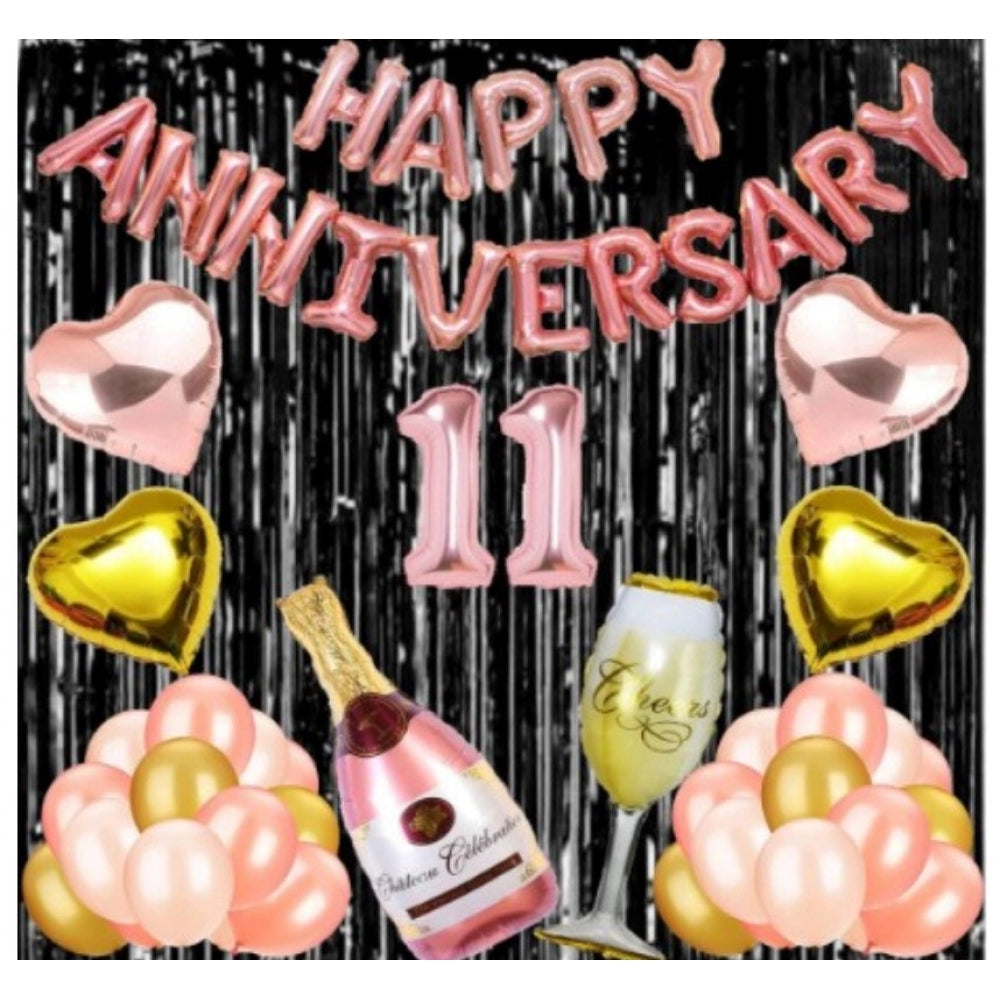 Rose gold foil balloons with "11th Anniversary" decoration, champagne glass, black background.