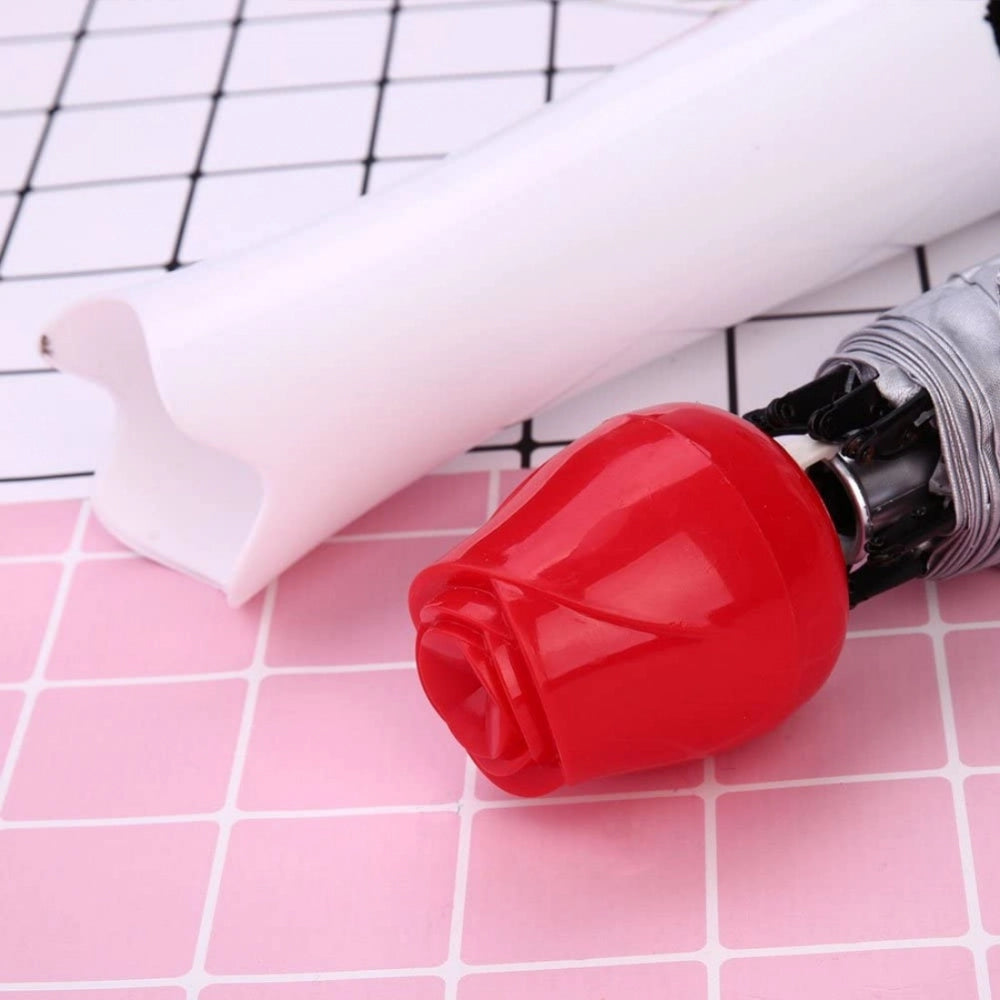 Lightweight waterproof rose umbrella with UV protection in canvas & plastic, compact bottle included, assorted designs, ideal for travel