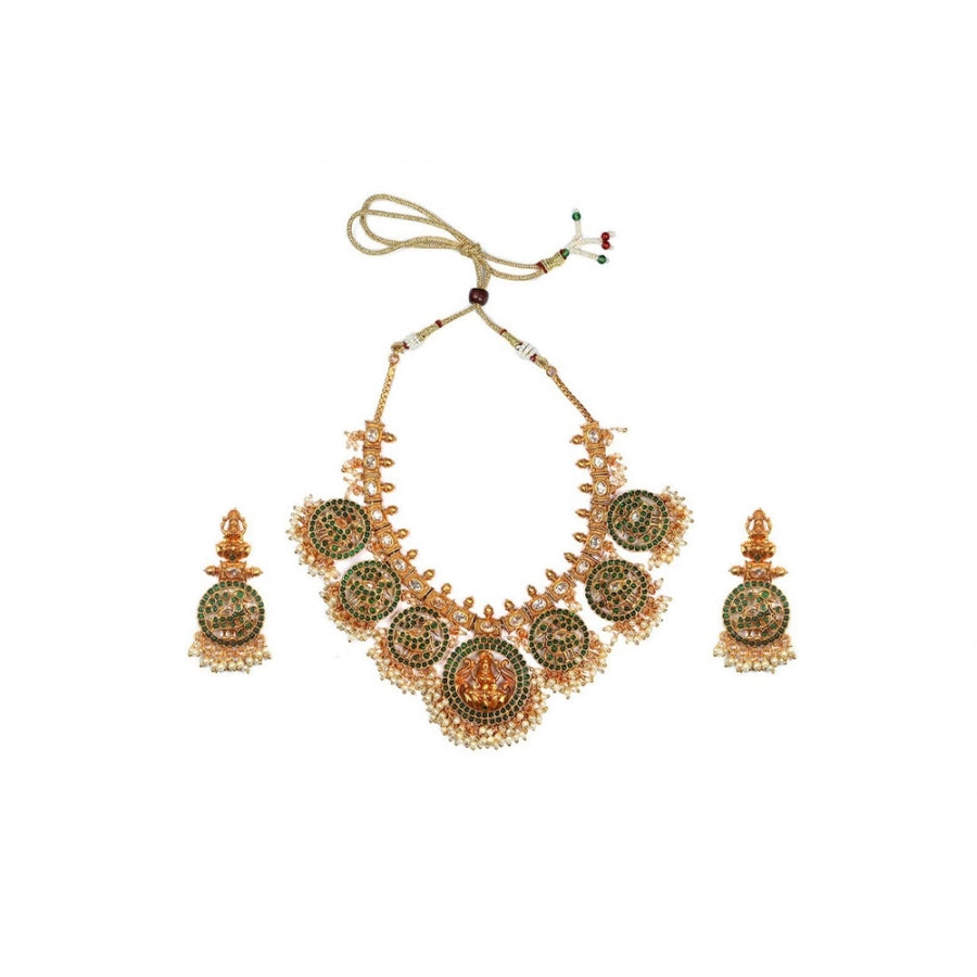 Green, gold plated temple necklace and jhumka set for women's glamour style accessory, jewelry on display stand