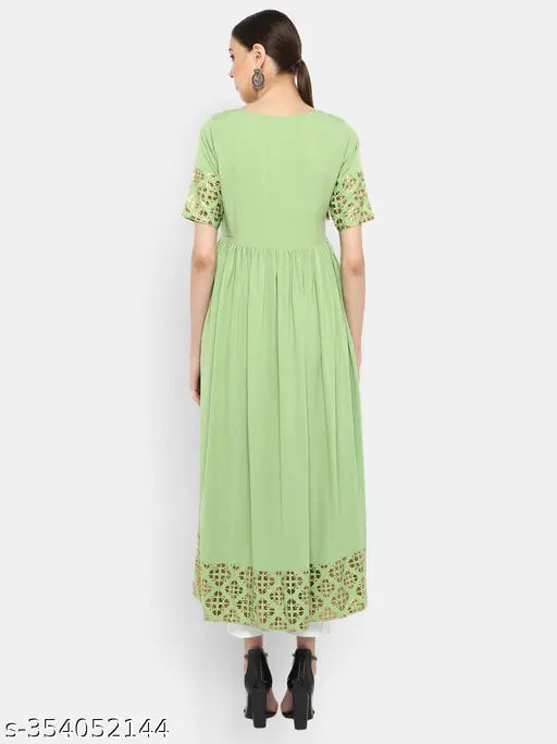 Light green poly crepe flared kurta with gold print for women, Indian fashion on mannequin