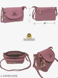 Red sling bag, women's fashion accessory, crossbody style, with adjustable strap, multiple pockets, and gold accent details
