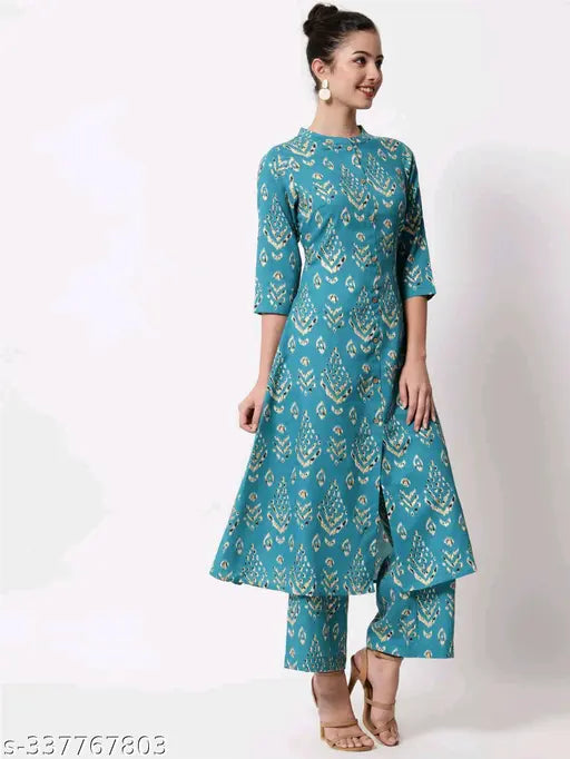 Stylish blue cotton kurta palazzo set with dupatta, featuring three-quarter sleeves and printed design. Indian ethnic wear suitable for office, college, or party events. Handcrafted in India, home washable, and lightweight