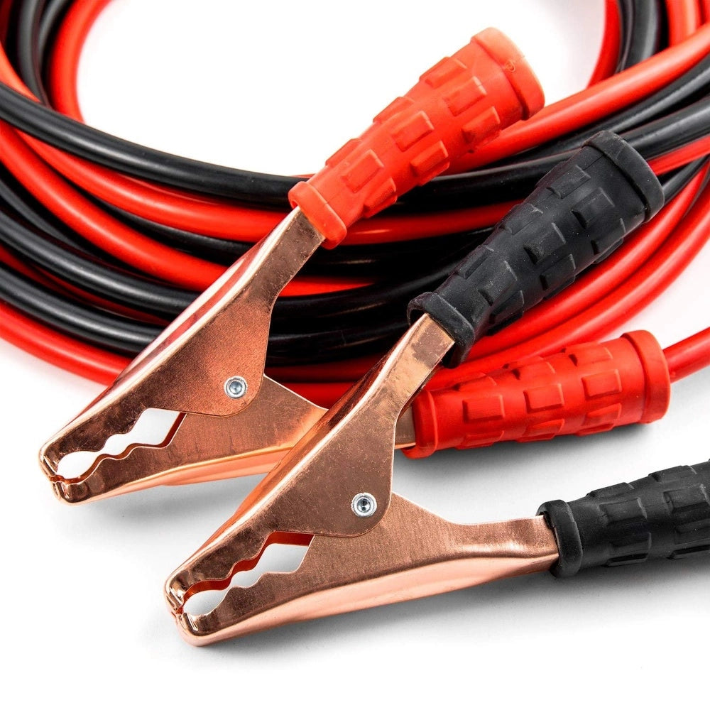 Red heavy-duty jumper cables with copper clamps and textured black handles.