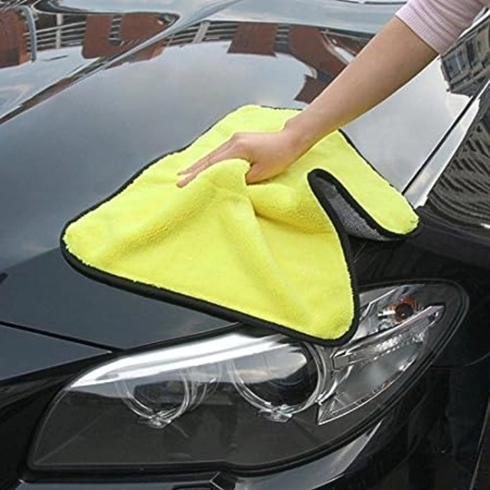 Yellow and black microfiber cloth for car detailing and drying, preferred by professionals worldwide