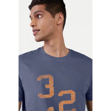 Blue printed cotton men's casual half sleeve crew neck T-shirt with comfortable fit, featuring vibrant imagery on sleeves and chest