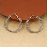 Antique multi-color earrings combo. Silver-toned, intricate design, 6 pairs.