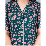 Teal printed viscose rayon half-sleeve shirt with pyjama pant night suit set on mannequin