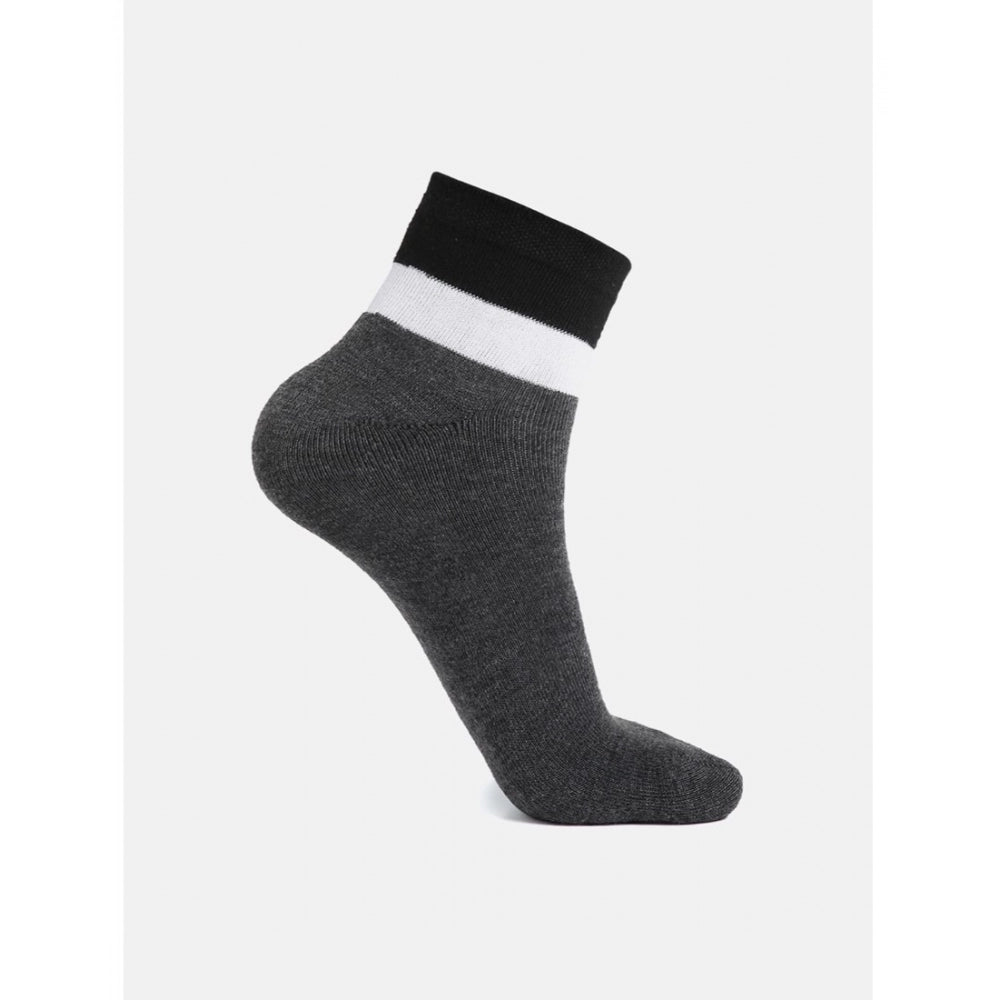 Assorted cotton blended men's casual ankle socks, solid pattern, varying colors displayed