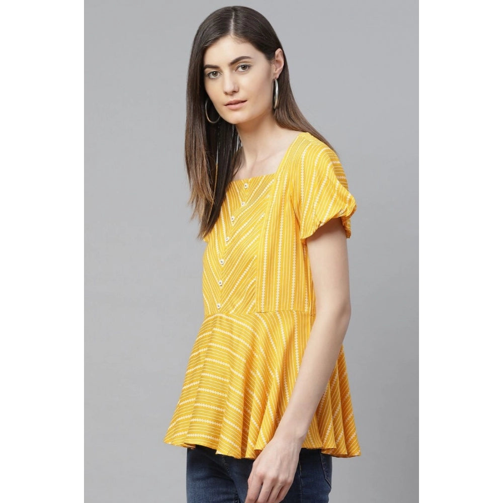 Mustard stripe printed rayon women's casual short sleeve top on mannequin