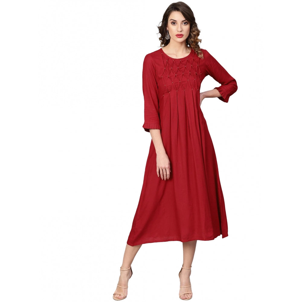 Women's casual, maroon rayon dress with long sleeves