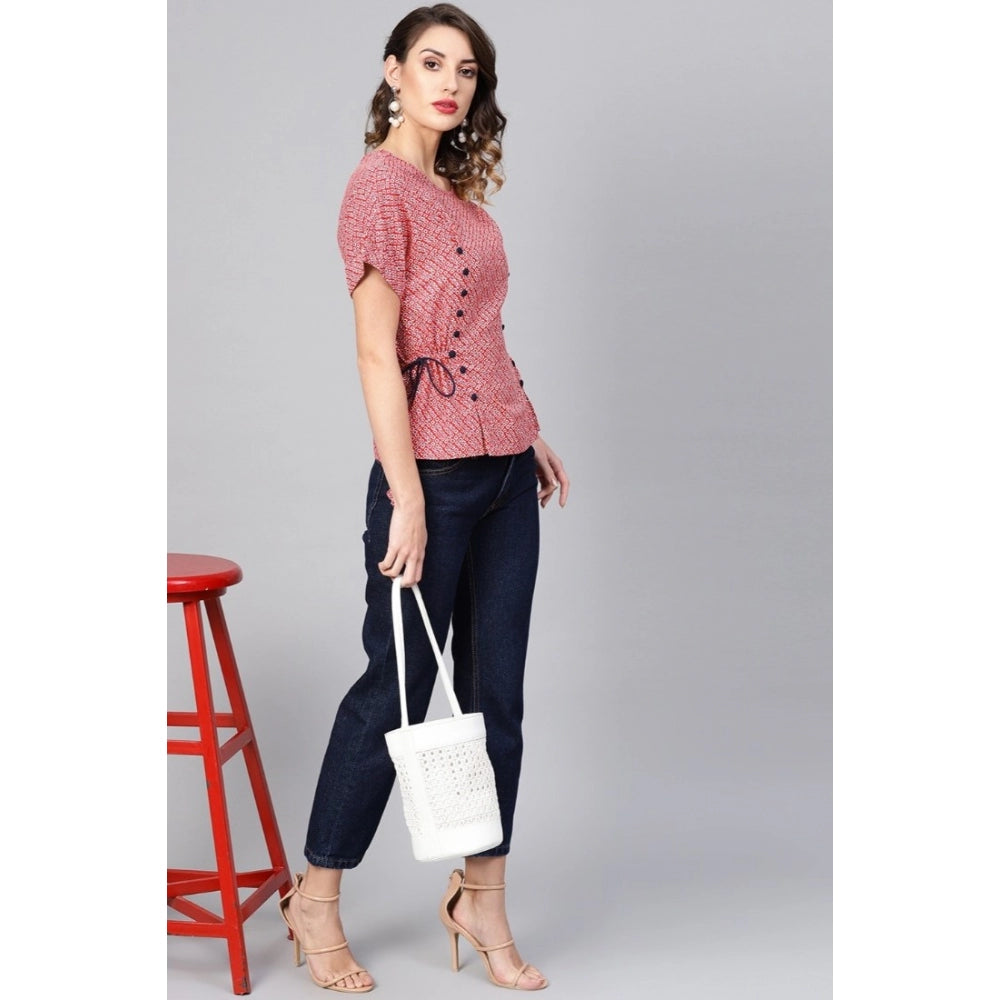 Red geometric rayon women's casual short sleeve top on hanger