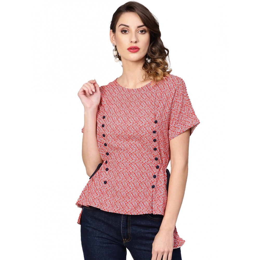 Red geometric rayon women's casual short sleeve top on model