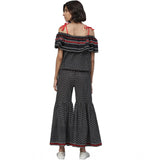 Women's casual dress with black geometric print and off-shoulder sleeves