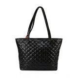 A black womens shoulder bag with a textured design