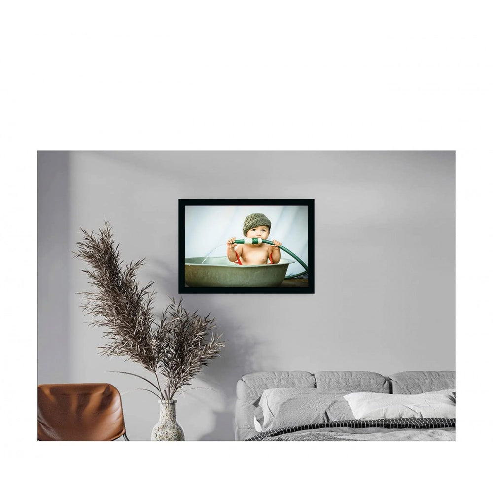 Multicolored painting of a baby photo within a synthetic frame