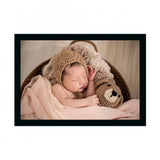 Baby photo painting in a multicolor frame