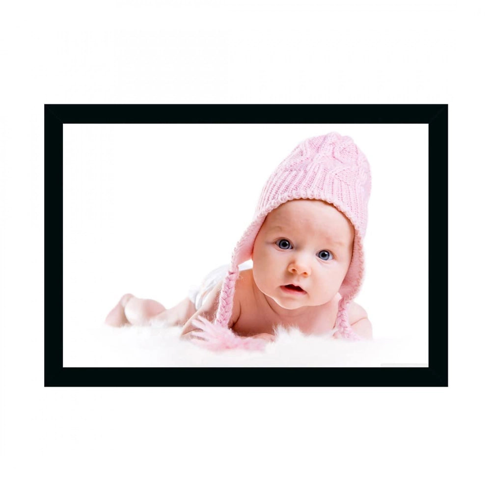 Synthetic photo frame with printed baby portrait in a white frame