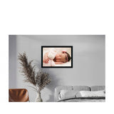 Multicolor baby photo painting within a synthetic frame