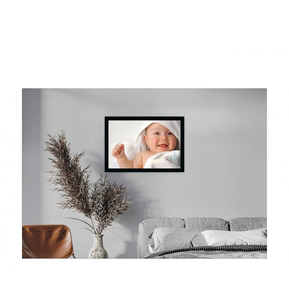 Multicolored photo painting of a baby in a frame