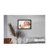 Multicolored photo painting of a baby in a frame