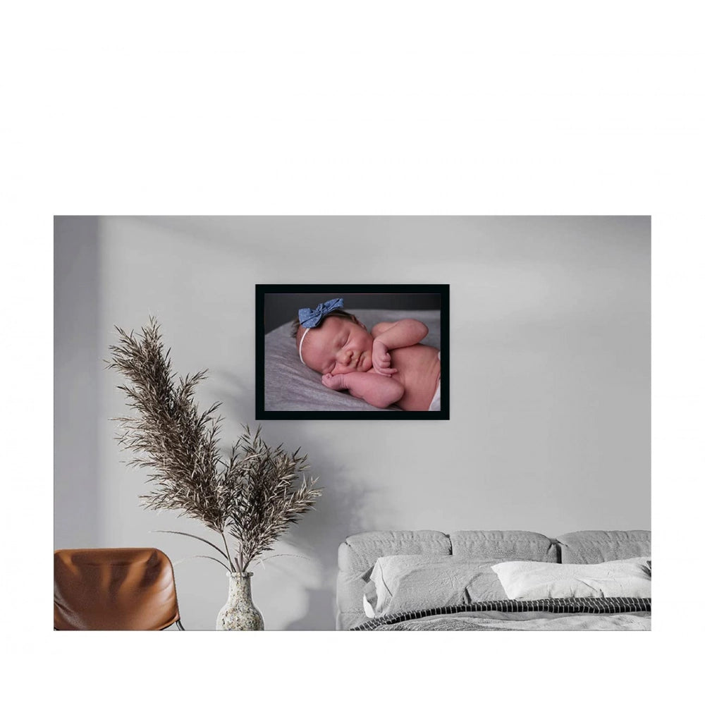 Multicolor baby photo painting in a realistic photo frame
