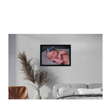 Multicolor baby photo painting in a realistic photo frame