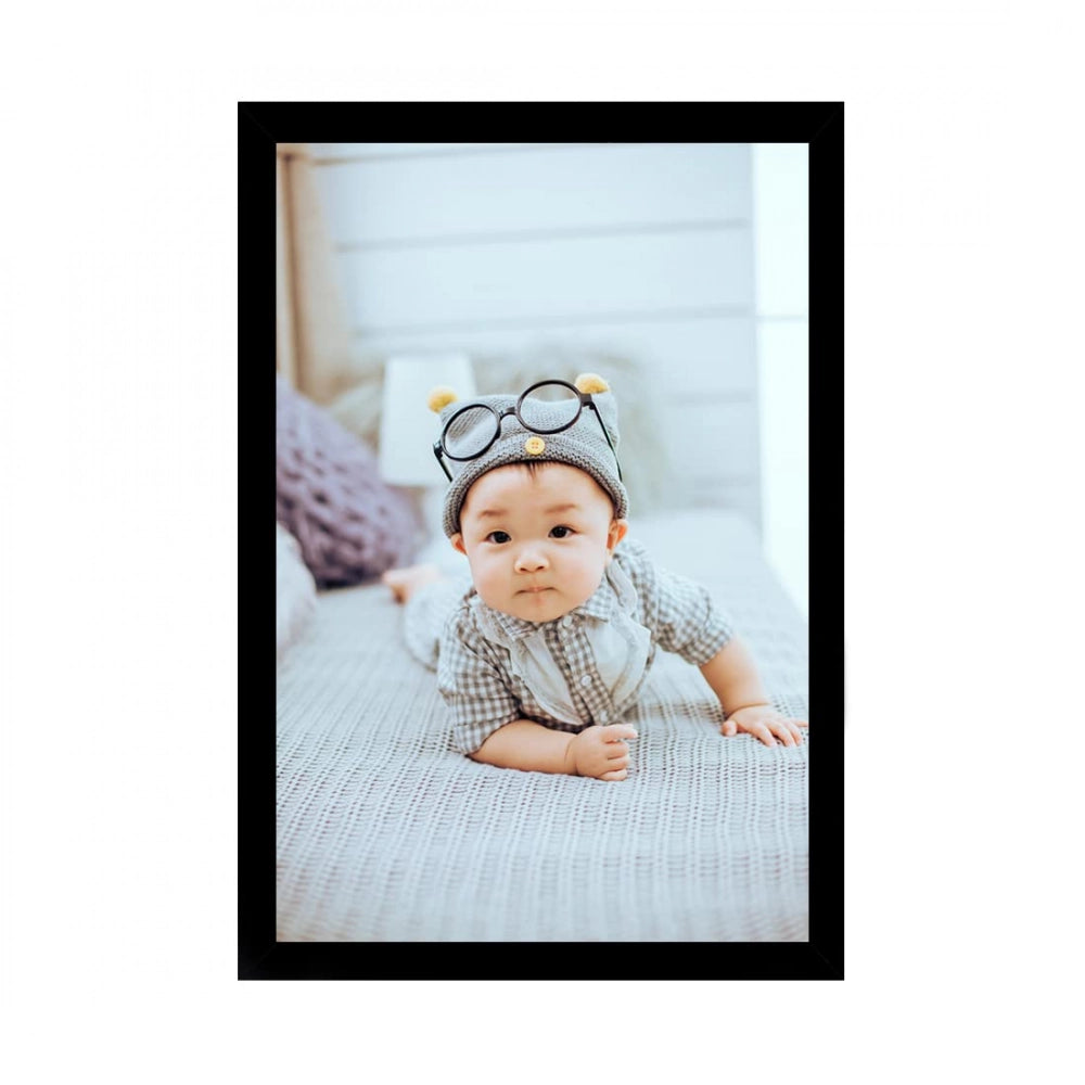Multicolor baby photo painting in a synthetic photo frame