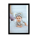 Multicolor baby photo painting in a synthetic photo frame