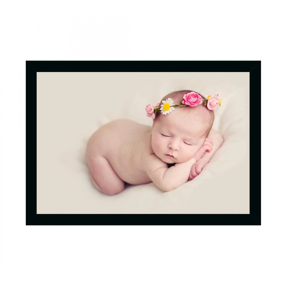 Multicolor baby photo painting of sleeping newborn with floral hairband and pink rose headband, framed within a black photo frame with glass