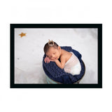 Multicolor photo painting of a baby in a blanket within a photo frame
