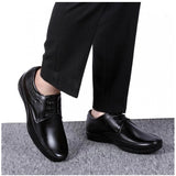 Black synthetic leather formal shoes for men, solid pattern with lace-up closure for a stylish formal occasion