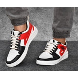 White synthetic men's casual shoes, solid design with lace-up closure, suitable for everyday wear