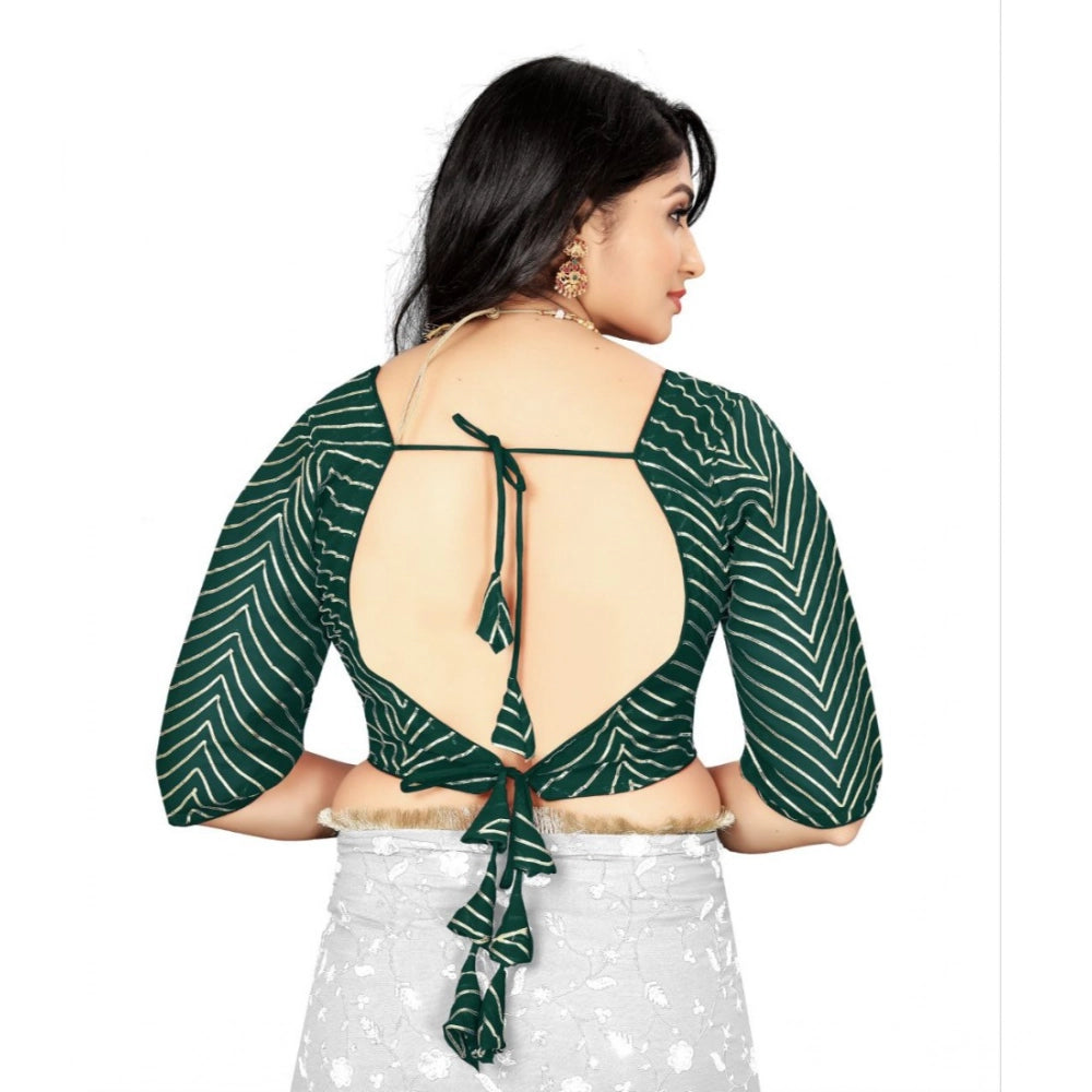 Green Georgette embroidered blouse, free size, 3/4 sleeves, V-neck on clothing hanger