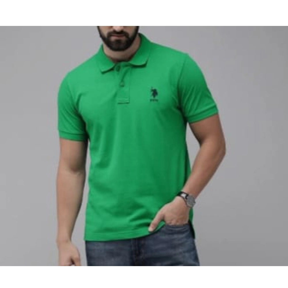 Green cotton men's casual half-sleeve solid polo neck t-shirt, regular fit on mannequin
