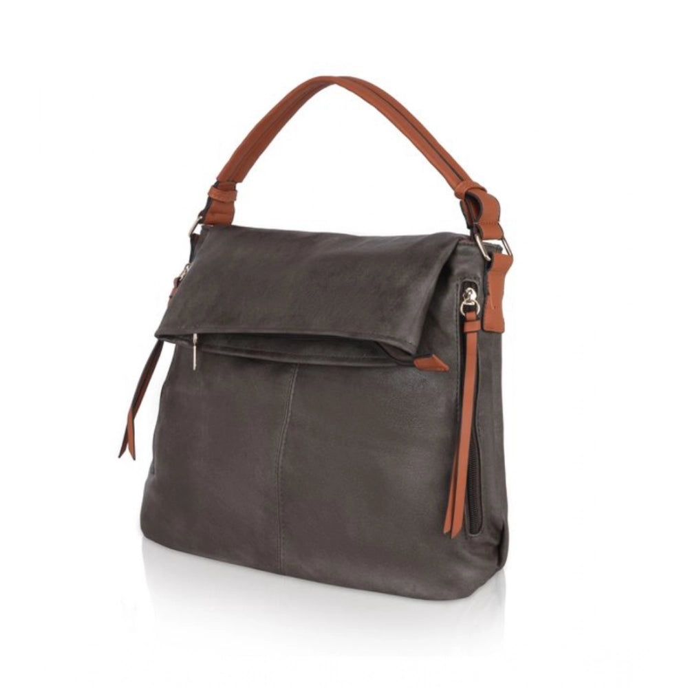 Green faux leather sling bag with zipper closure and dual handle