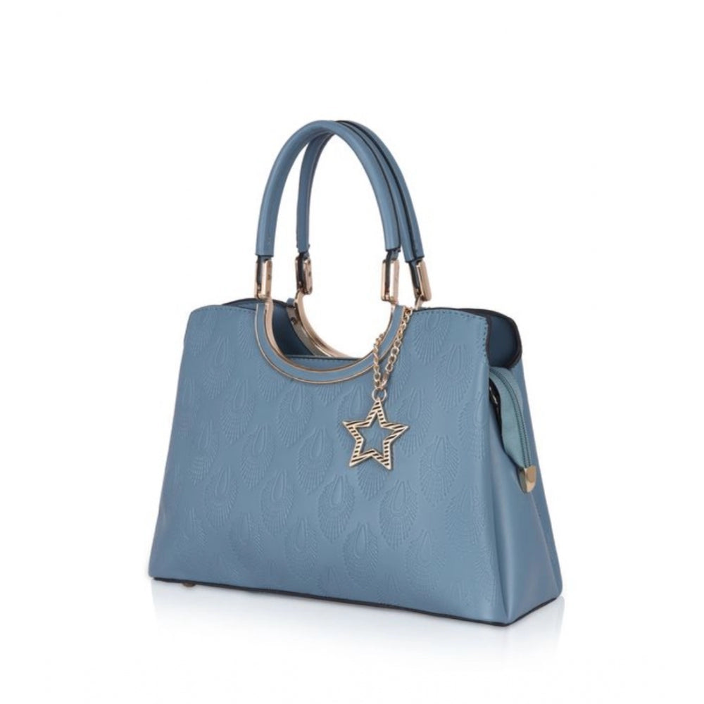 Long, blue, faux leather handbag with adjustable strap and printed design